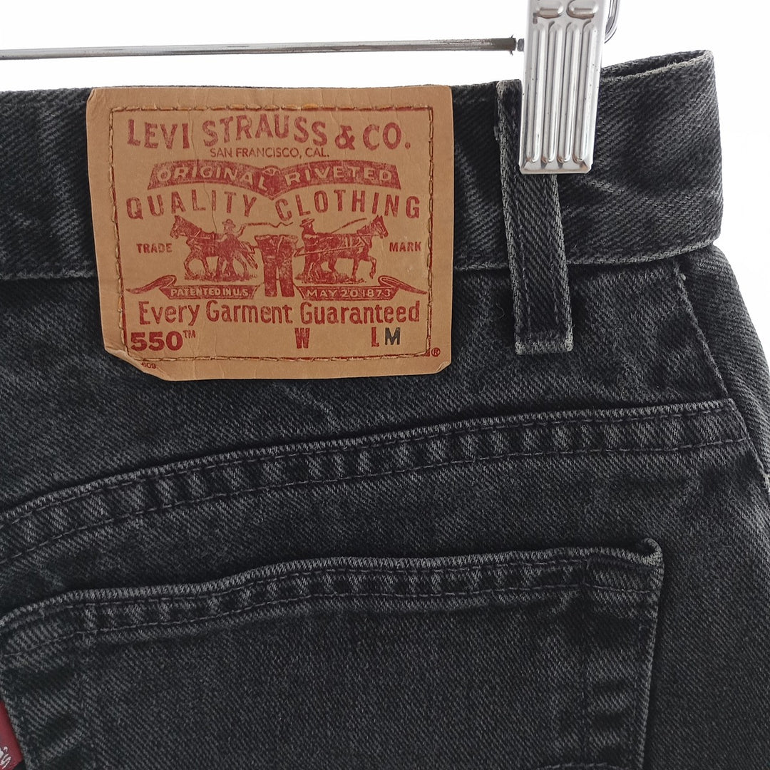 00'S Levi's 550 RELAXED FIT TAPERED LEG Black denim tapered denim pants women's L (w28) /eaa400597