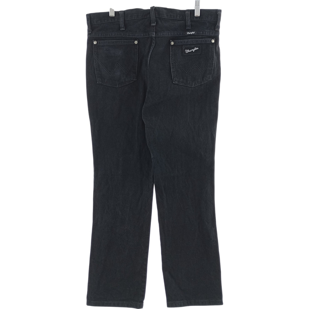 Vintage 90s-00'S Wrangler black denim tapered denim pants for men, size W35. cotton black type Vintage Second Hand