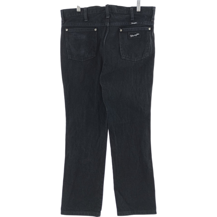 Vintage 90s-00'S Wrangler black denim tapered denim pants for men, size W35. cotton black type Vintage Second Hand