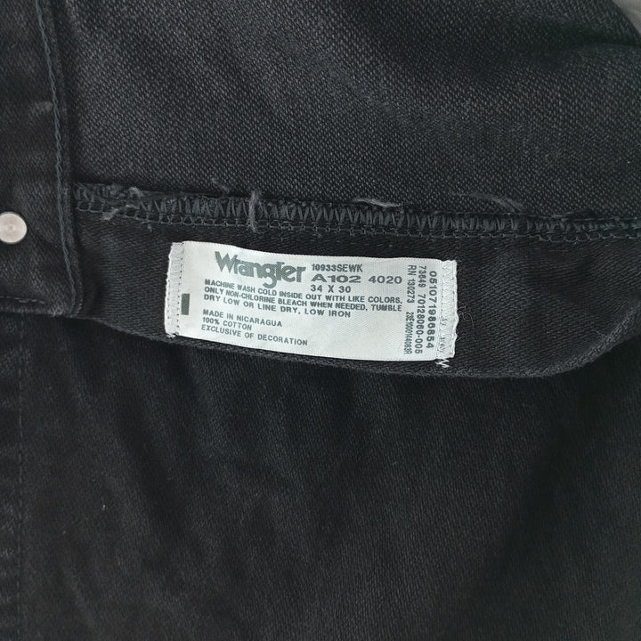 Vintage 90s-00'S Wrangler black denim tapered denim pants for men, size W35. cotton black type Vintage Second Hand