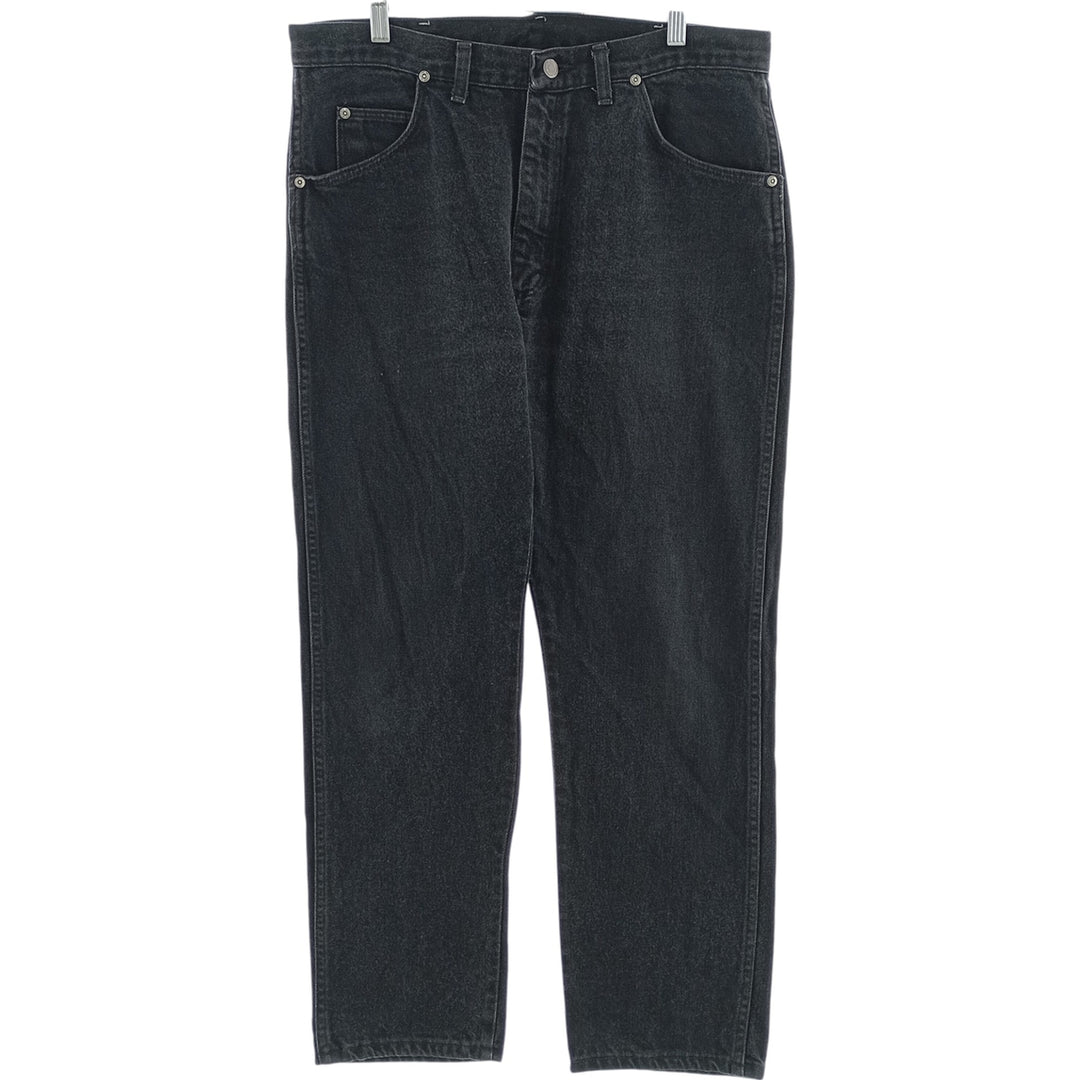 Vintage 1990'S Wrangler tapered black denim pants, made in the USA, men's size W35. cotton black type Vintage Second Hand