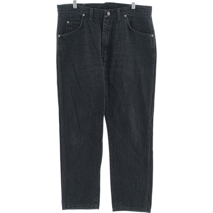 Vintage 1990'S Wrangler tapered black denim pants, made in the USA, men's size W35. cotton black type Vintage Second Hand