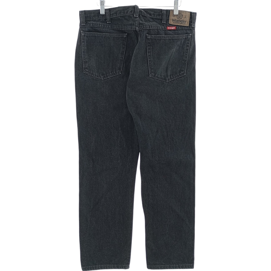 Vintage 1990'S Wrangler tapered black denim pants, made in the USA, men's size W35. cotton black type Vintage Second Hand