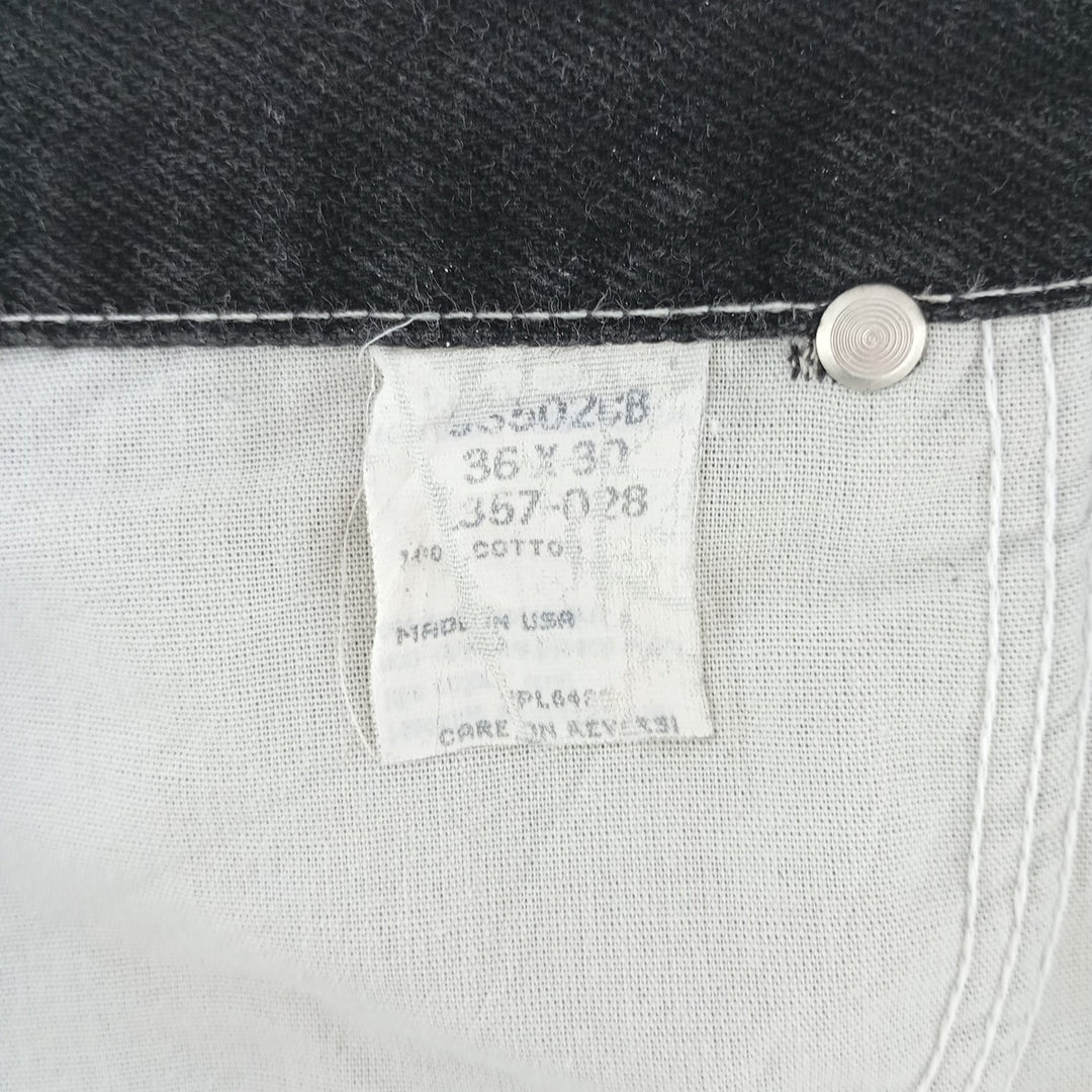 Vintage 1990'S Wrangler tapered black denim pants, made in the USA, men's size W35. cotton black type Vintage Second Hand