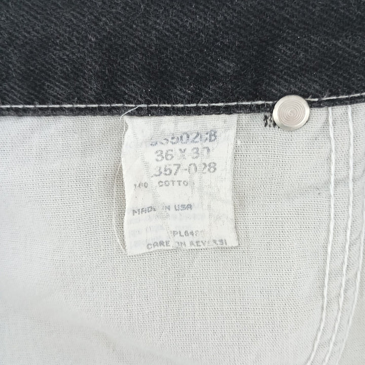 Vintage 1990'S Wrangler tapered black denim pants, made in the USA, men's size W35. cotton black type Vintage Second Hand