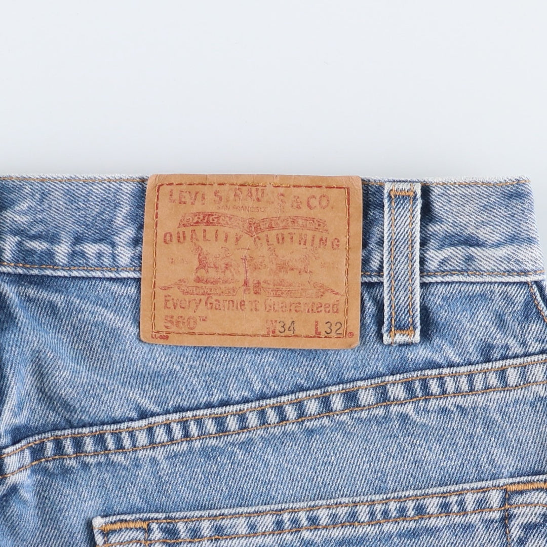 00'S Levi's 560 LOOSE FIT TAPERED LEG tapered denim pants for men, size w34 cotton blue type Vintage Second Hand