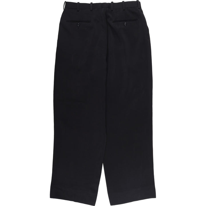Three-pleat slacks pants for men, size W32 polyester black type Vintage Second Hand