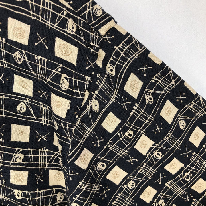 Pierre Cardin all-over print short-sleeved rayon shirt, boxy fit, men's size L. Rayon black type Vintage Second Hand