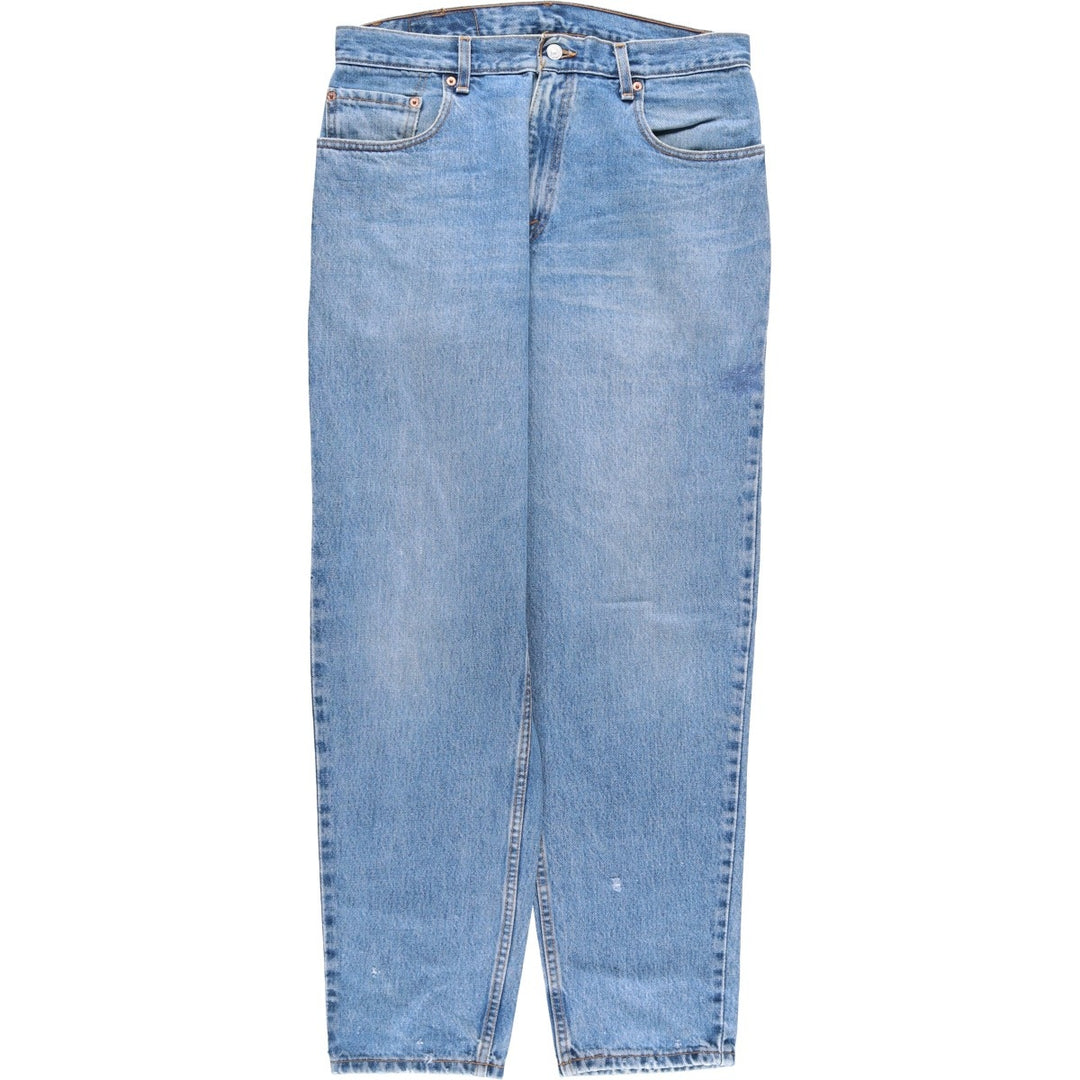 00'S Levi's 560 LOOSE FIT TAPERED LEG tapered denim pants made in the USA, men's size w34 cotton blue type Vintage Second Hand