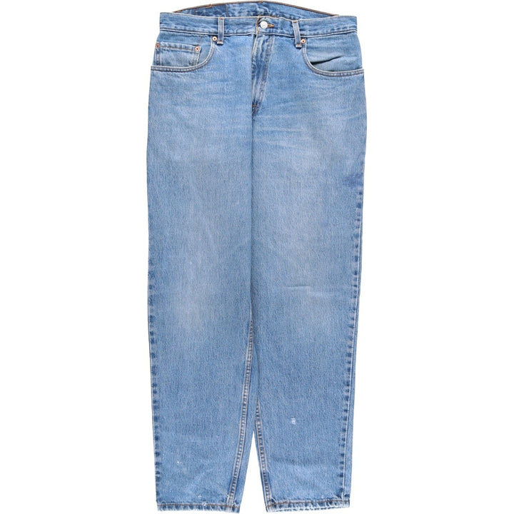 00'S Levi's 560 LOOSE FIT TAPERED LEG tapered denim pants made in the USA, men's size w34 cotton blue type Vintage Second Hand