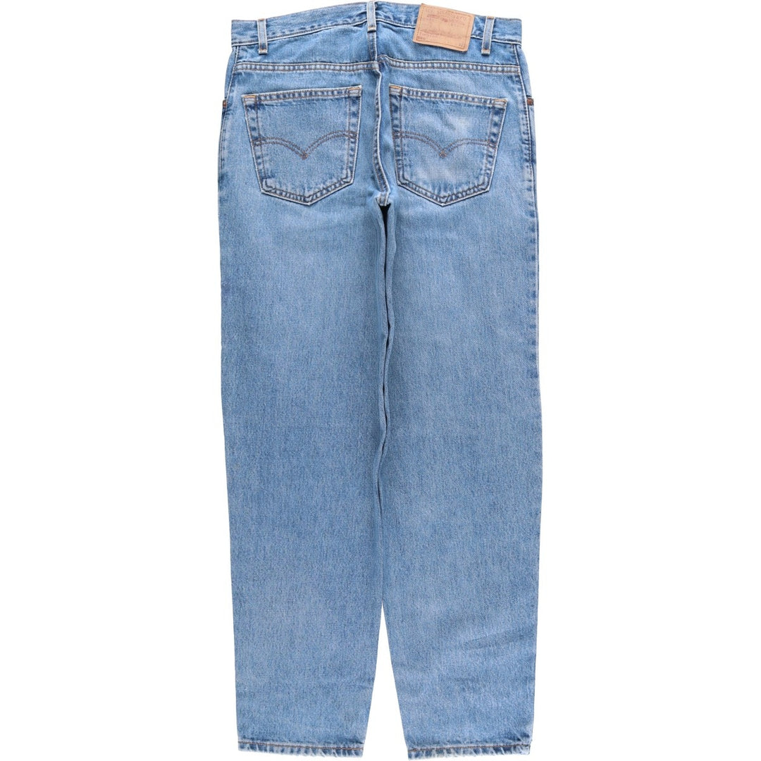 00'S Levi's 560 LOOSE FIT TAPERED LEG tapered denim pants made in the USA, men's size w34 cotton blue type Vintage Second Hand