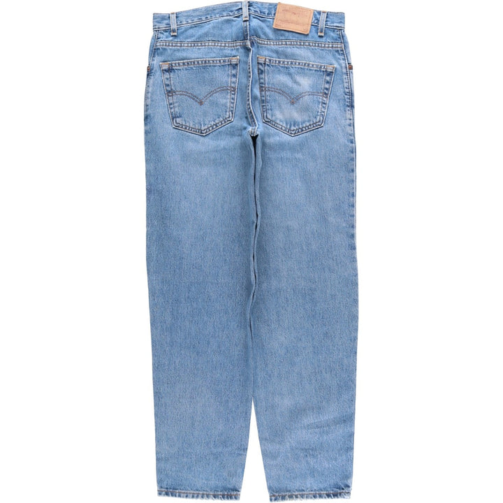 00'S Levi's 560 LOOSE FIT TAPERED LEG tapered denim pants made in the USA, men's size w34 cotton blue type Vintage Second Hand