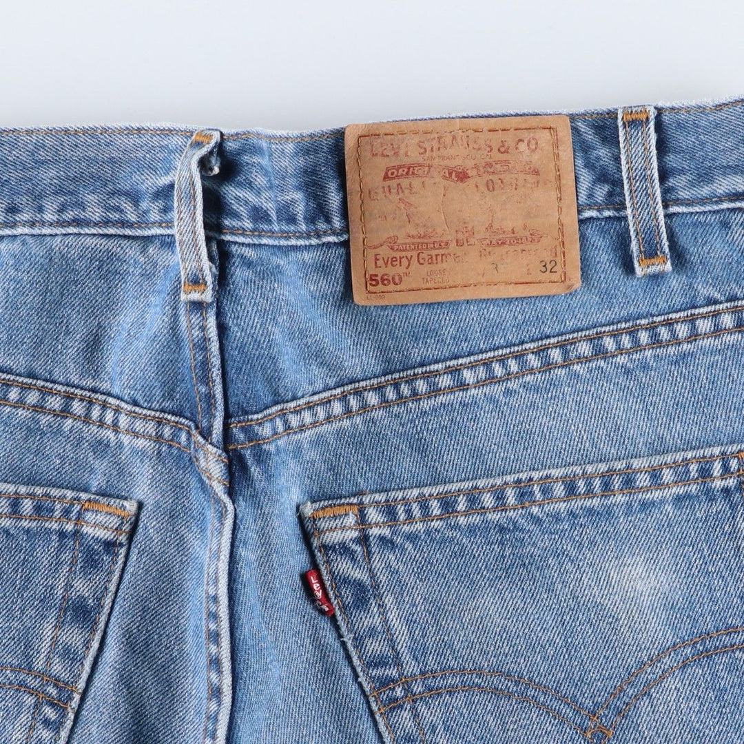 00'S Levi's 560 LOOSE FIT TAPERED LEG tapered denim pants made in the USA, men's size w34 cotton blue type Vintage Second Hand