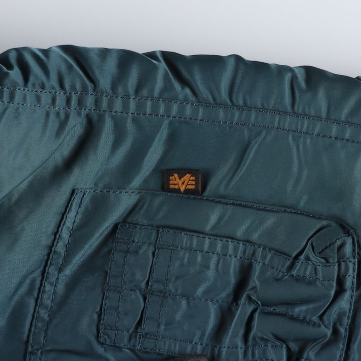 Civilian-grade Alpha Industries N-2B type padded military flight jacket, men's size M equivalent. Nylon blue type Vintage Second Hand