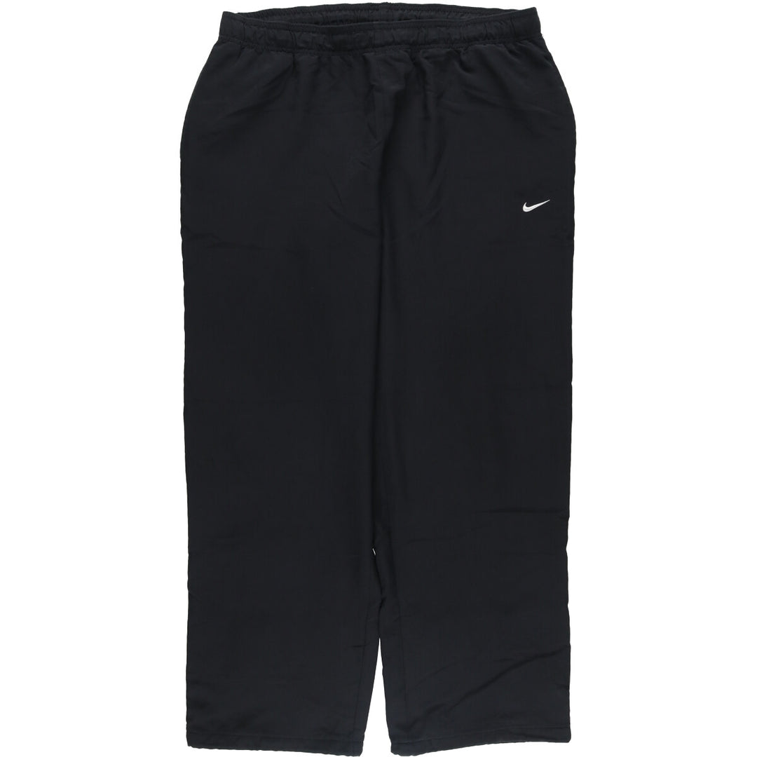 Nike the athletic department. Warm-up pants, nylon, crinkle-style pants, men's size XL. unclear black type Vintage Second Hand