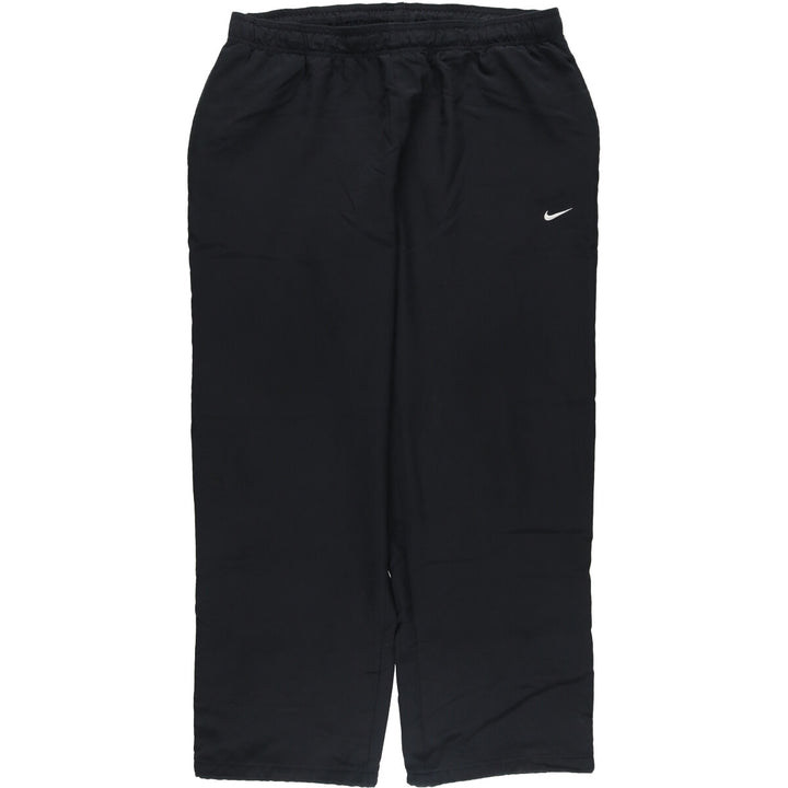 Nike the athletic department. Warm-up pants, nylon, crinkle-style pants, men's size XL. unclear black type Vintage Second Hand