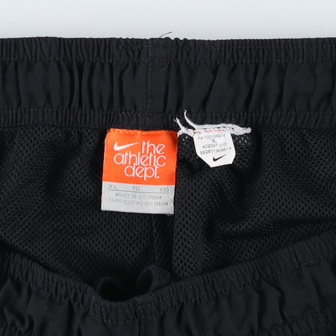 Nike the athletic department. Warm-up pants, nylon, crinkle-style pants, men's size XL. unclear black type Vintage Second Hand