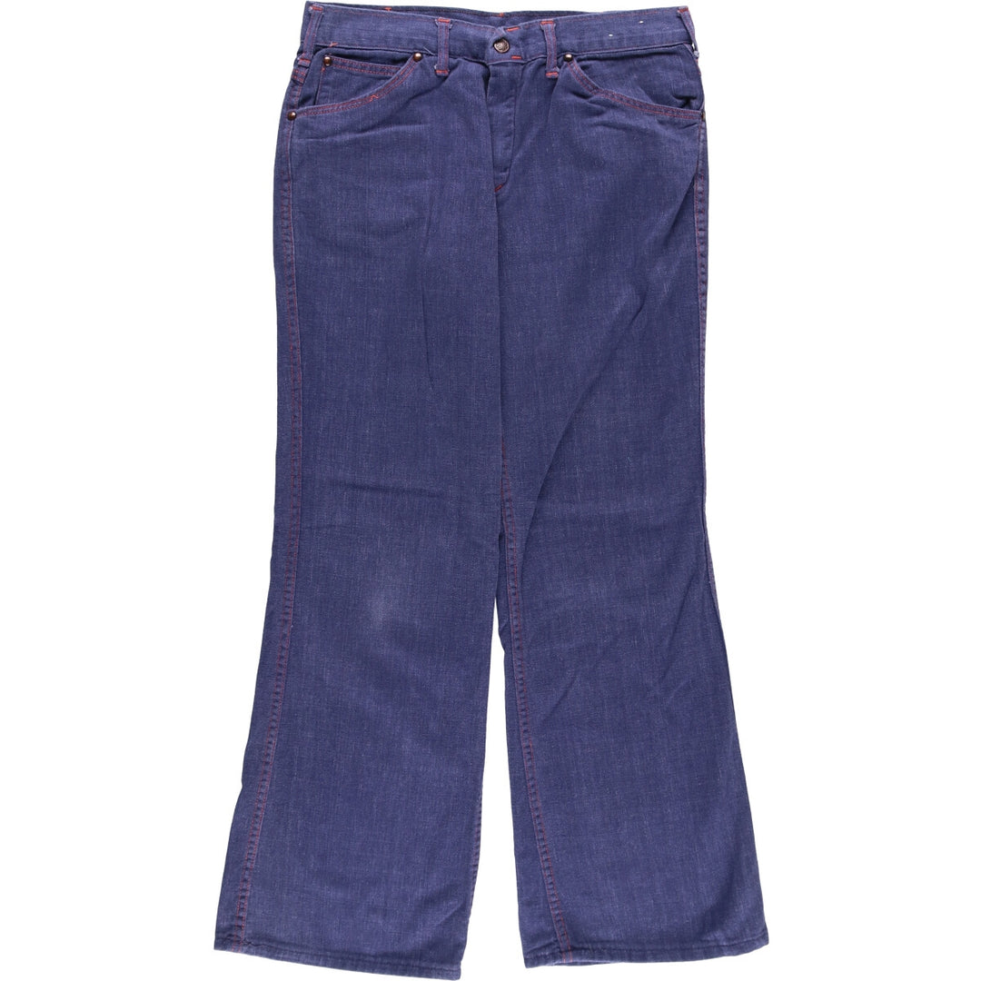 Vintage flare cut denim pants for women, size L (w30) unclear blue type Vintage Second Hand
