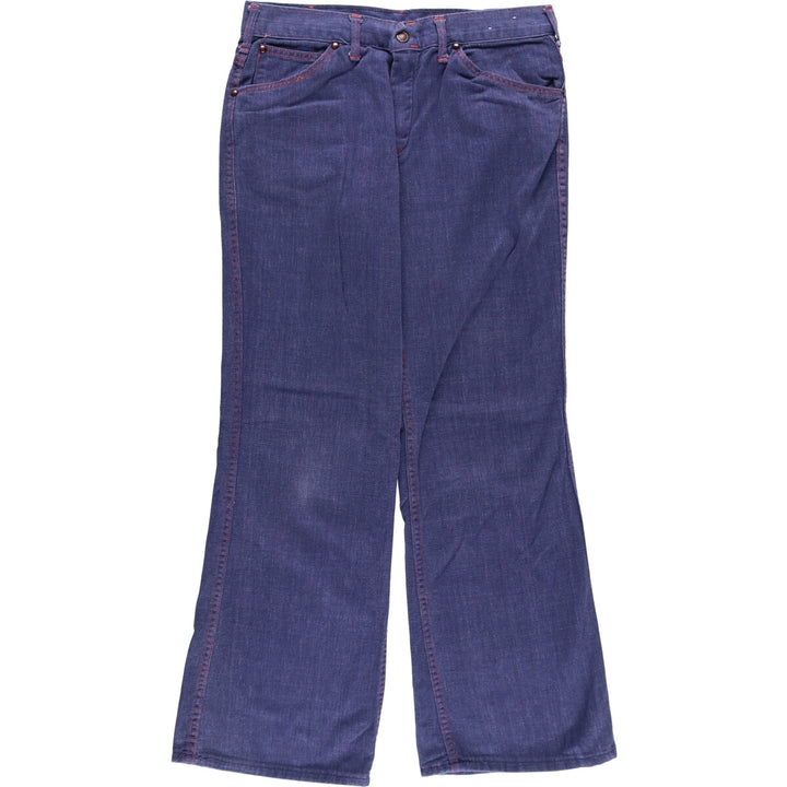 Vintage flare cut denim pants for women, size L (w30) unclear blue type Vintage Second Hand