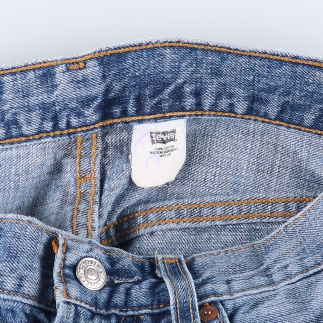 00'S Levi's 15501-0574 Straight denim pants for men, size W32 cotton blue type Vintage Second Hand