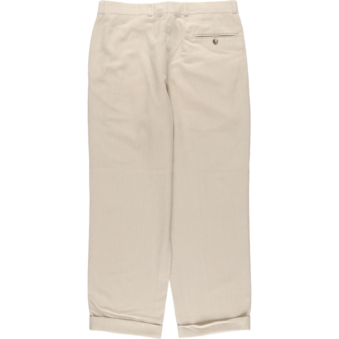 Vintage two-pleat slacks for men, size W34 polyester Beige type Vintage Second Hand