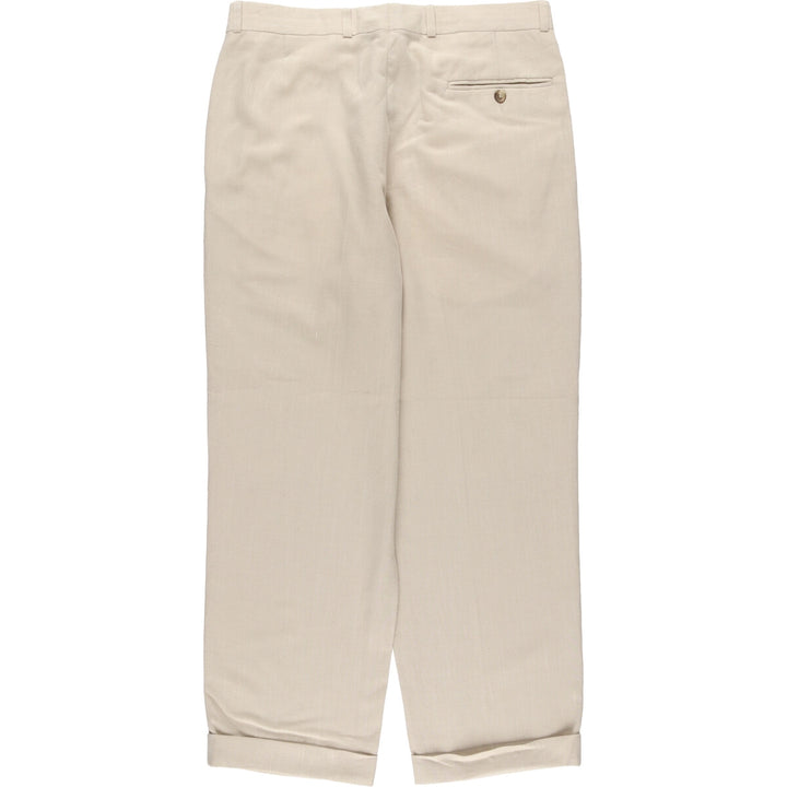 Vintage two-pleat slacks for men, size W34 polyester Beige type Vintage Second Hand