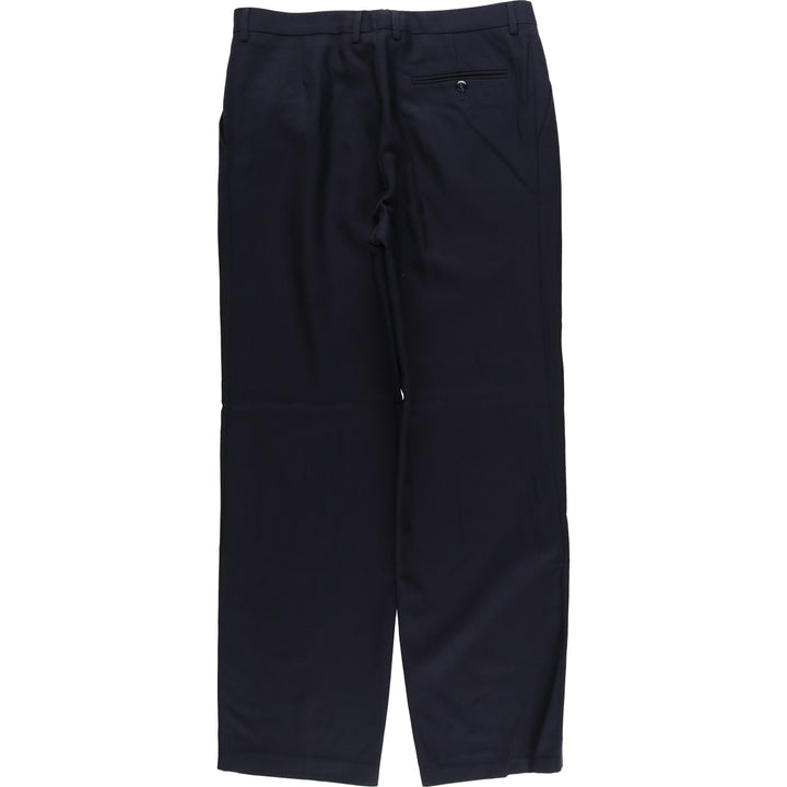 Vintage two-pleat slacks for men, size W33 unclear navy blue type Vintage Second Hand