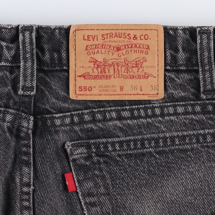 90s-00'S Levi's 550 Relaxed Fit Tapered Leg Tapered Denim Pants with Orange Tabs and Black Denim, Made in Canada cotton black type Vintage Second Hand