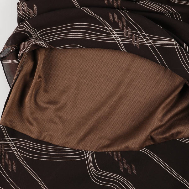 All-over print long A-line tiered skirt, women's size XS unclear brown type Vintage Second Hand