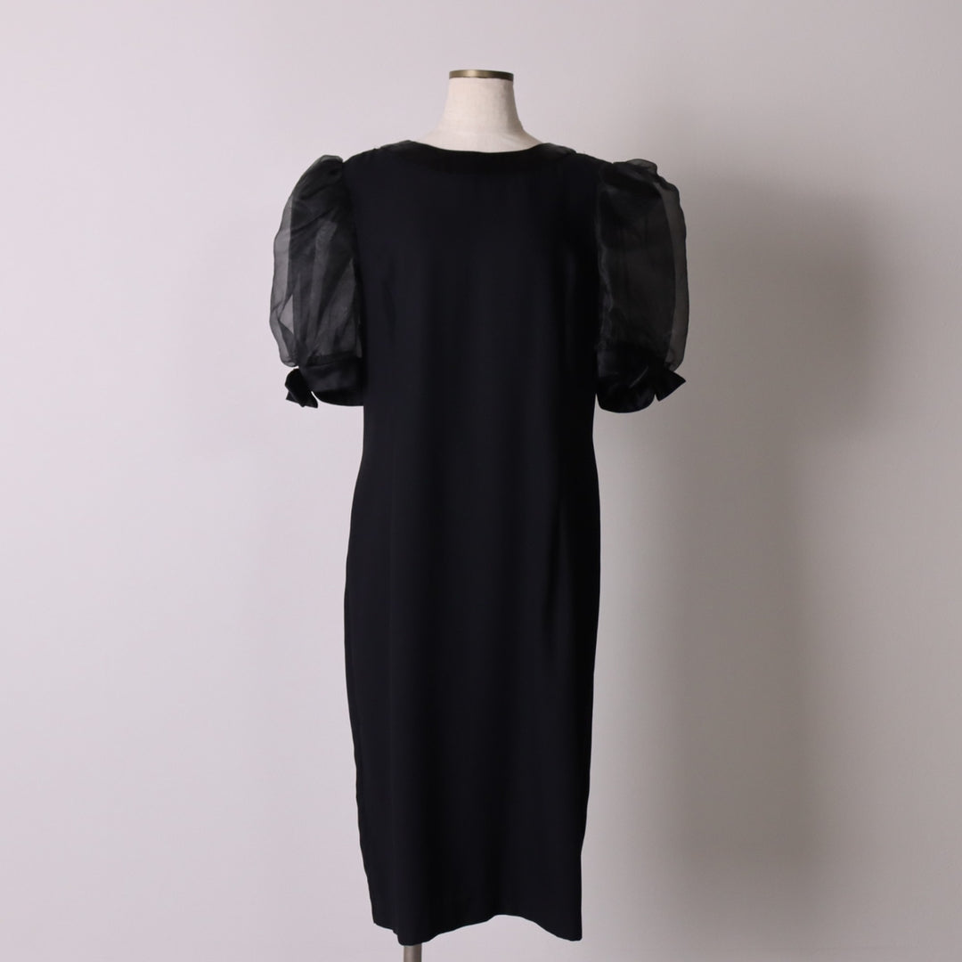 Vintage 60s-70'S Michael Marcella puff sleeve midi dress, made in the USA, women's size XL unclear black type Vintage Second Hand
