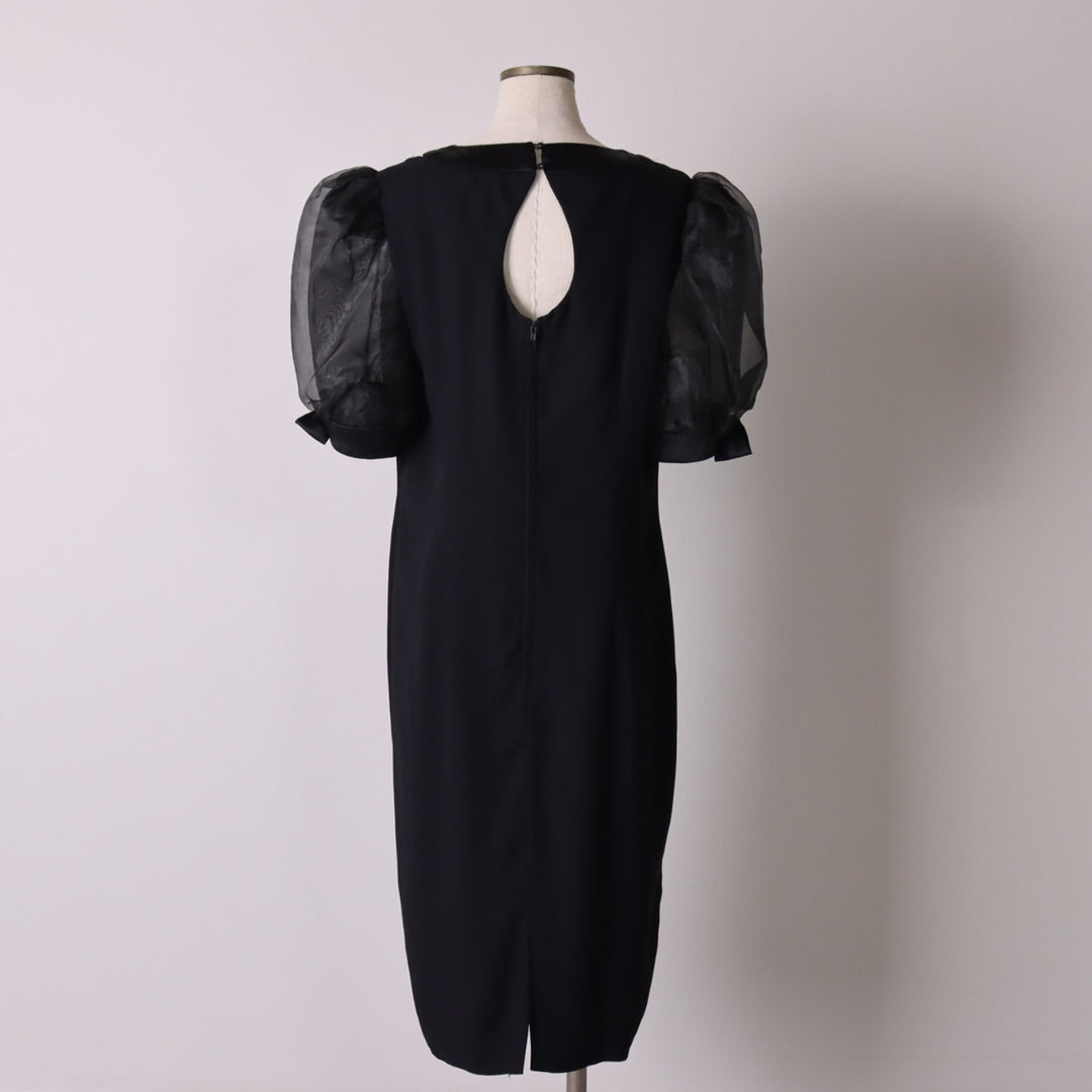 Vintage 60s-70'S Michael Marcella puff sleeve midi dress, made in the USA, women's size XL unclear black type Vintage Second Hand