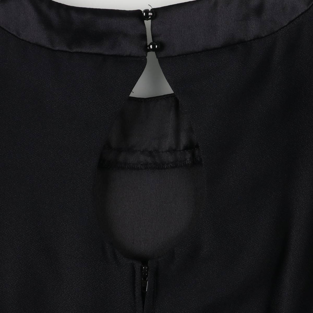 Vintage 60s-70'S Michael Marcella puff sleeve midi dress, made in the USA, women's size XL unclear black type Vintage Second Hand