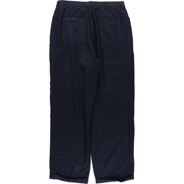 Vintage two-pleat slacks for men, size W33 unclear navy blue type Vintage Second Hand