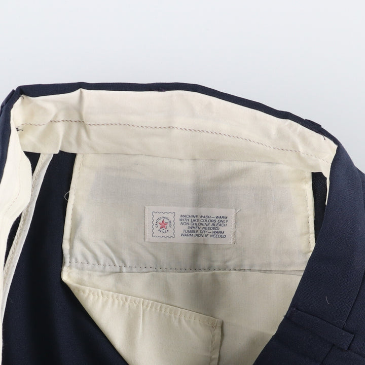 Two-pleat slacks pants for men, size W33 unclear navy blue type Vintage Second Hand