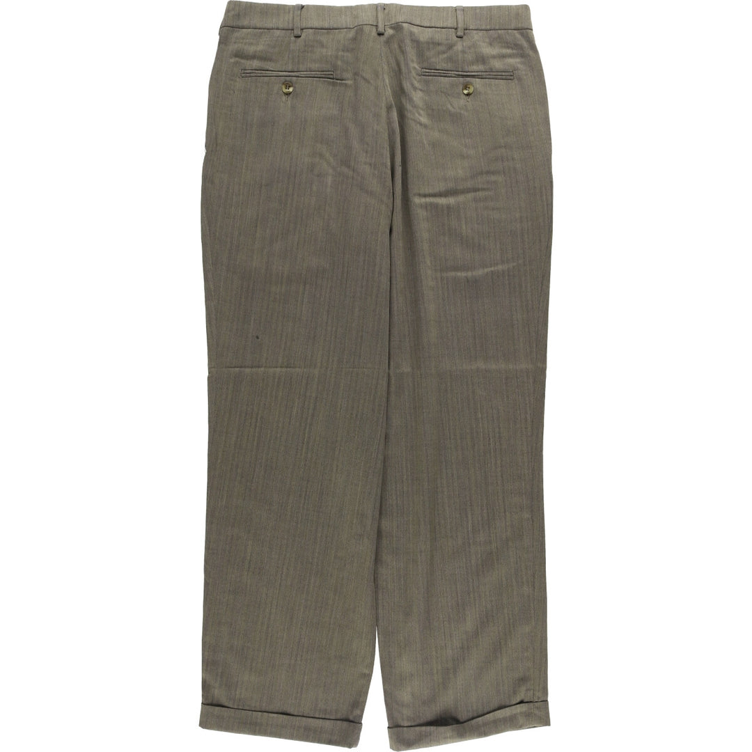 Dockers Pleated Relaxed Fit Two-Pleated Herringbone Polyester and Wool Pants, Men's Size 34 polyester gray type Vintage Second Hand