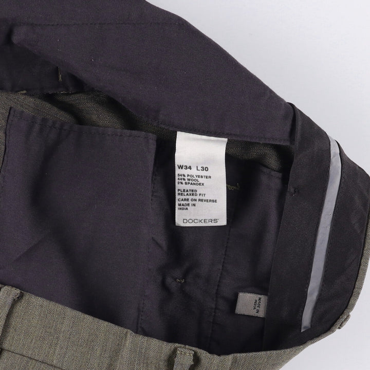 Dockers Pleated Relaxed Fit Two-Pleated Herringbone Polyester and Wool Pants, Men's Size 34 polyester gray type Vintage Second Hand