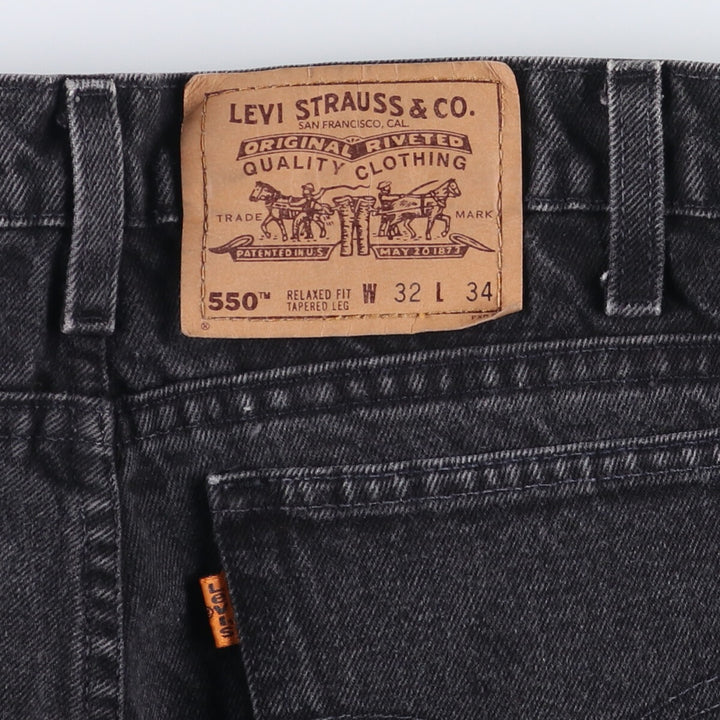 Levi's 550 Relaxed Fit Tapered Leg Men's Tapered Denim Pants with Orange Tabs and Black Denim, Size W30 unclear black type Vintage Second Hand