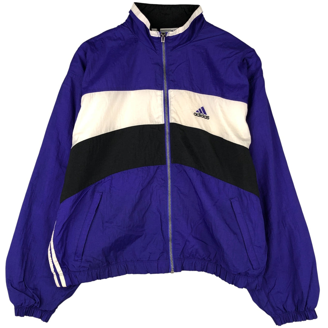 Vintage 90'S Adidas windbreaker with back logo, size L, men's unclear blue type Vintage Second Hand