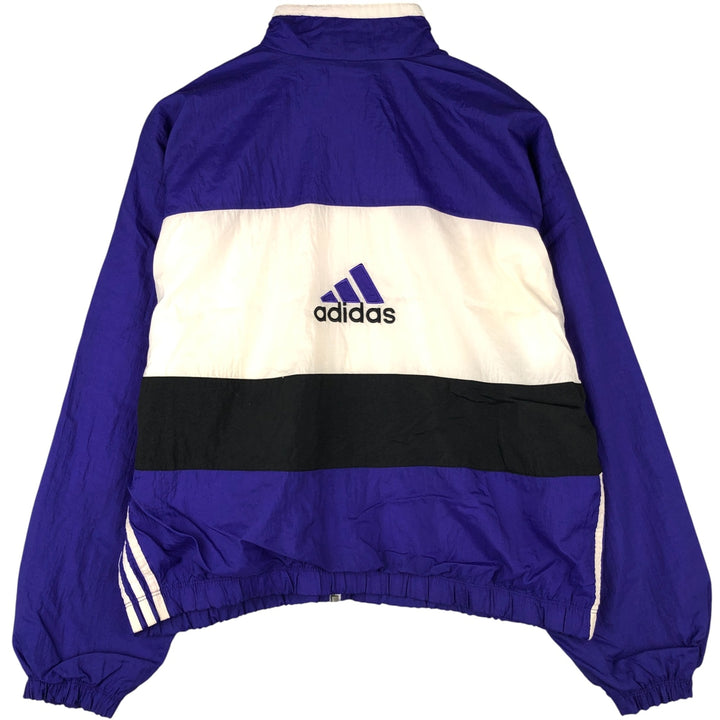 Vintage 90'S Adidas windbreaker with back logo, size L, men's unclear blue type Vintage Second Hand