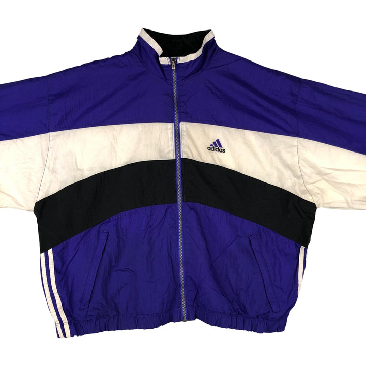 Vintage 90'S Adidas windbreaker with back logo, size L, men's unclear blue type Vintage Second Hand
