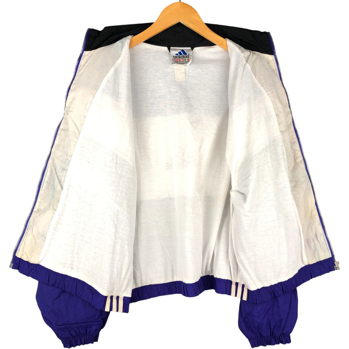 Vintage 90'S Adidas windbreaker with back logo, size L, men's unclear blue type Vintage Second Hand
