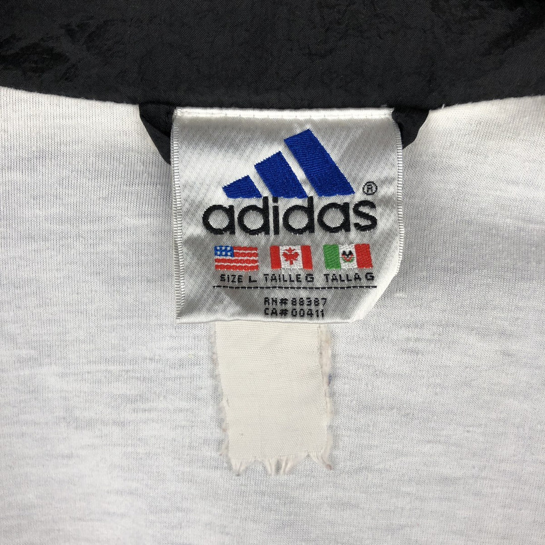 Vintage 90'S Adidas windbreaker with back logo, size L, men's unclear blue type Vintage Second Hand