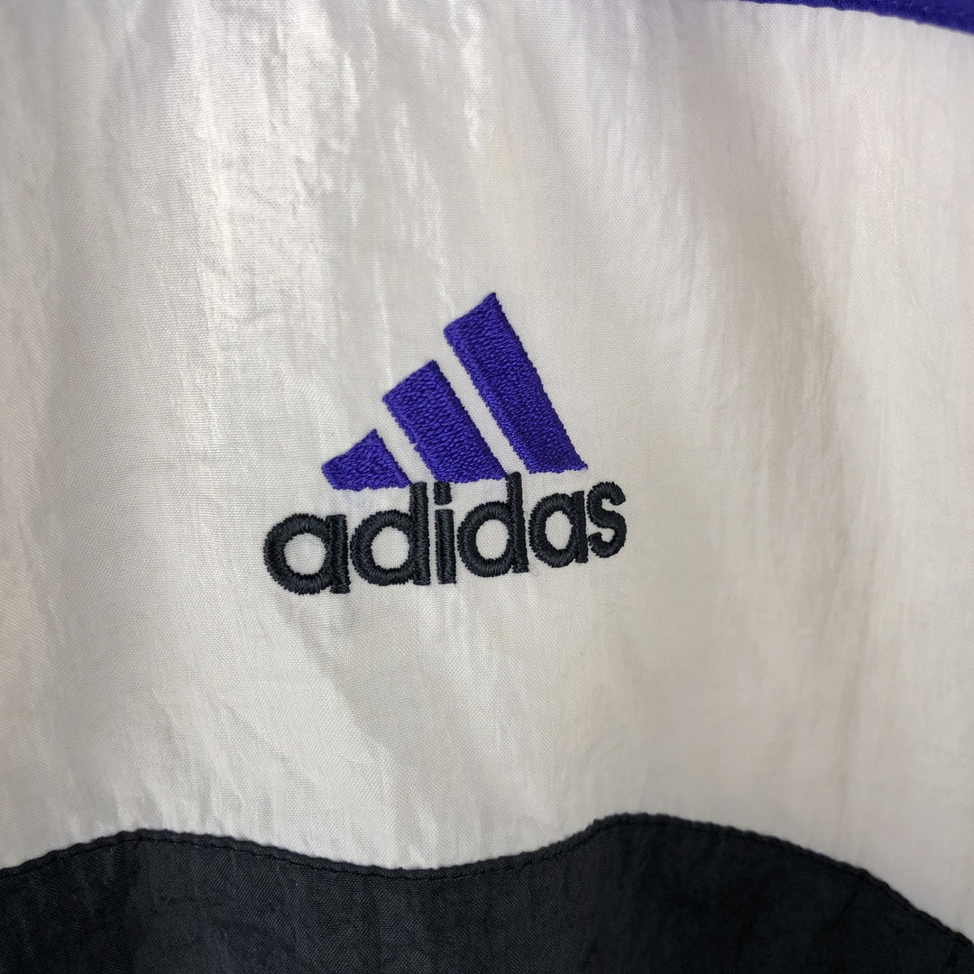 Vintage 90'S Adidas windbreaker with back logo, size L, men's unclear blue type Vintage Second Hand
