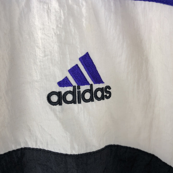 Vintage 90'S Adidas windbreaker with back logo, size L, men's unclear blue type Vintage Second Hand