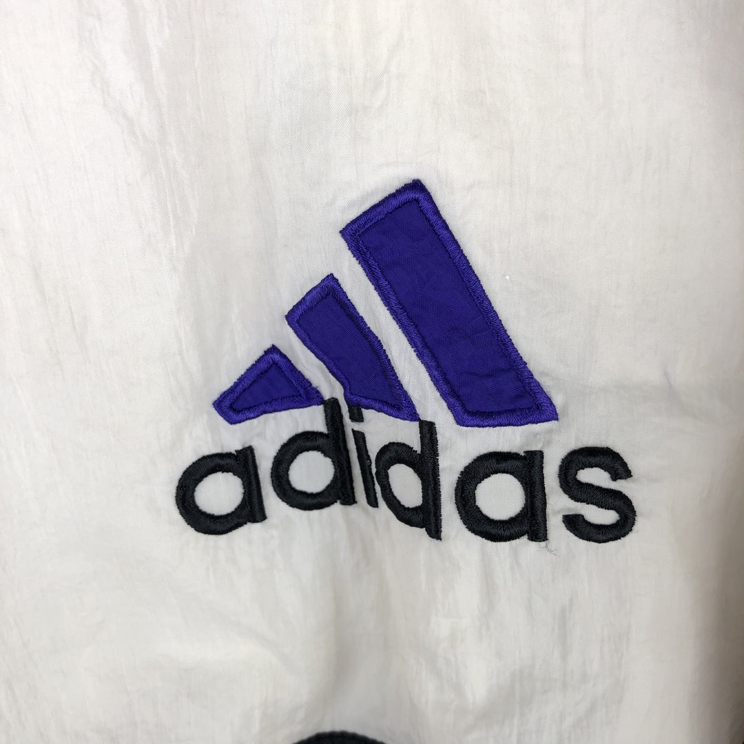 Vintage 90'S Adidas windbreaker with back logo, size L, men's unclear blue type Vintage Second Hand