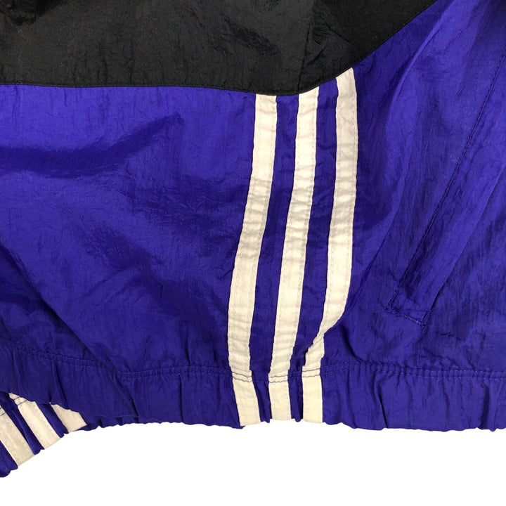Vintage 90'S Adidas windbreaker with back logo, size L, men's unclear blue type Vintage Second Hand