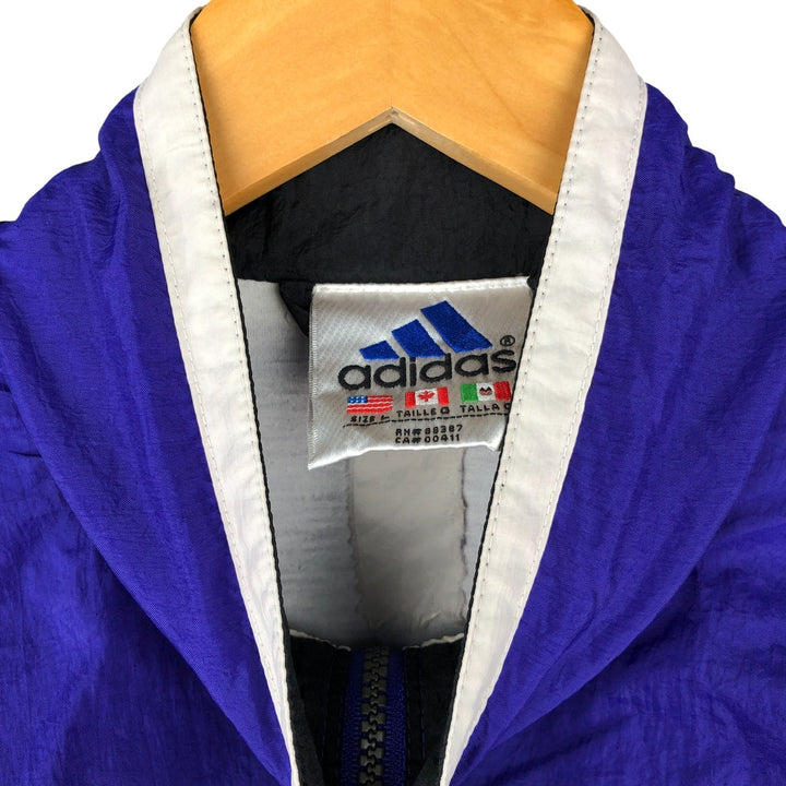 Vintage 90'S Adidas windbreaker with back logo, size L, men's unclear blue type Vintage Second Hand