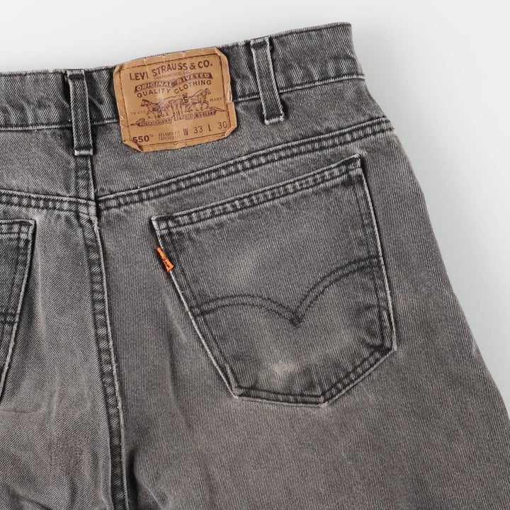 Levi's 550 Relaxed Fit Tapered Leg Men's Tapered Denim Pants with Orange Tabs and Black Denim, Size W33 unclear black type Vintage Second Hand