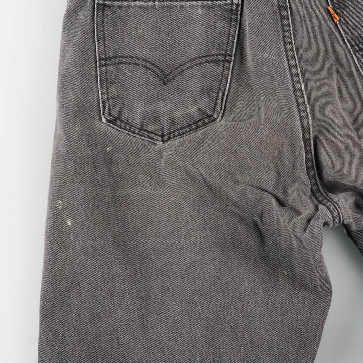 Levi's 550 Relaxed Fit Tapered Leg Men's Tapered Denim Pants with Orange Tabs and Black Denim, Size W33 unclear black type Vintage Second Hand