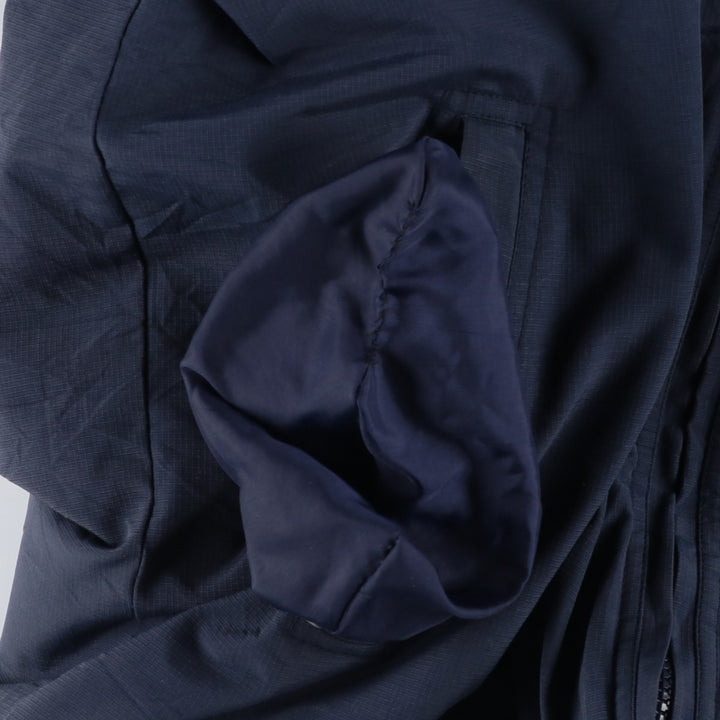 2000'S Nike padded puffer jacket, men's size M Nylon navy blue type Vintage Second Hand